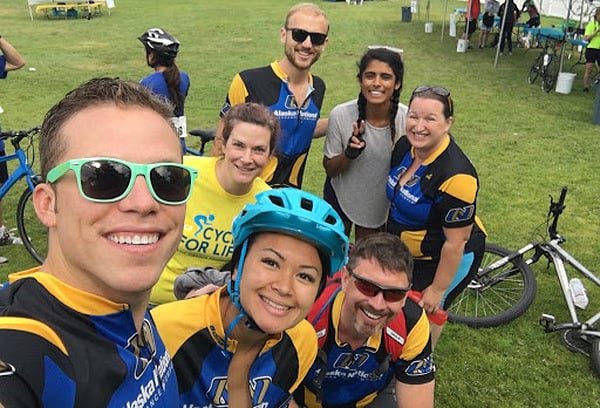 copperpoint employees at a bike race