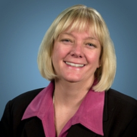 Ginny Arnett Caro, AINS, AIC
